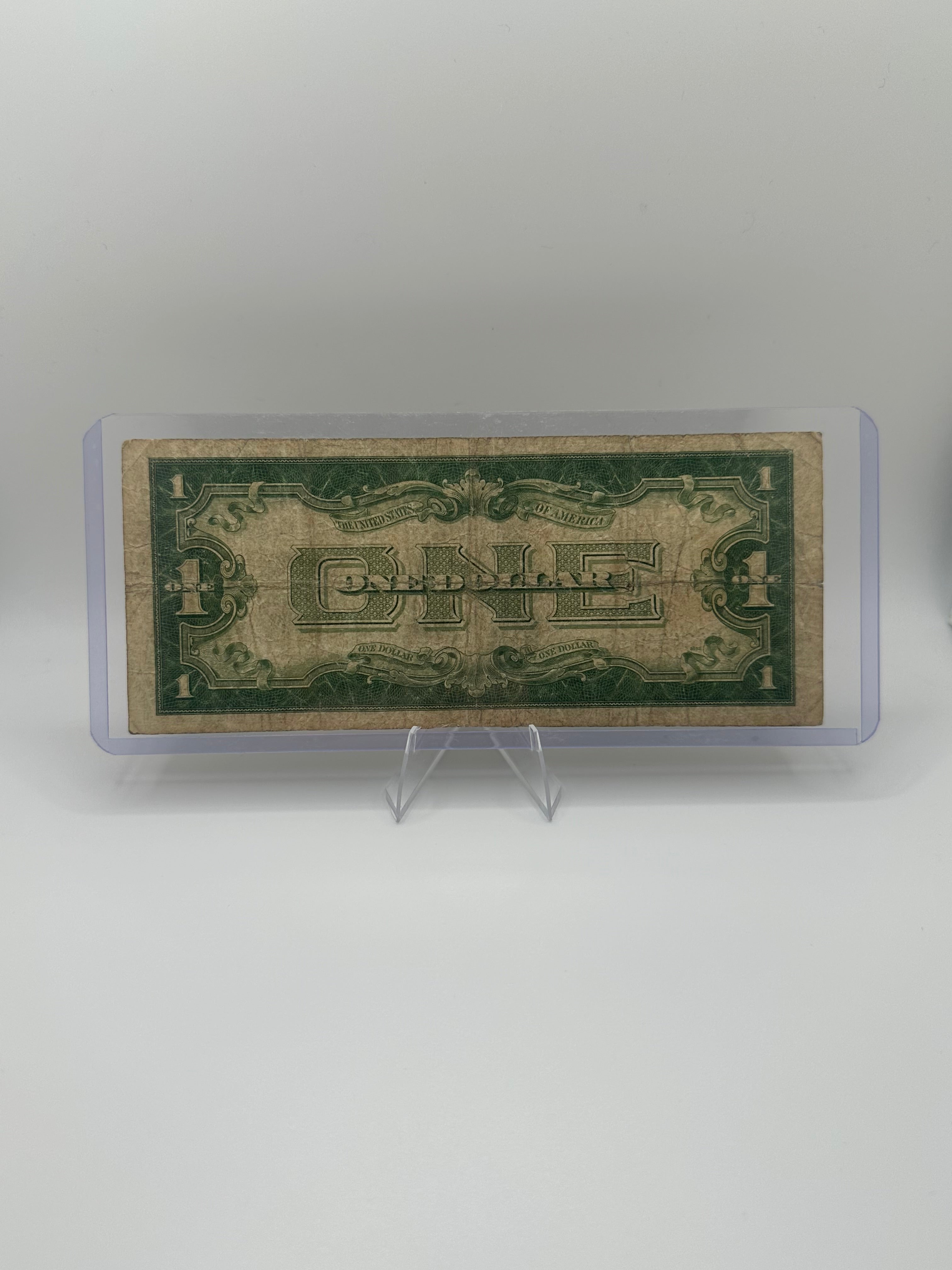 1934 $1 Silver Certificate – Funny Back, Raw Circulated